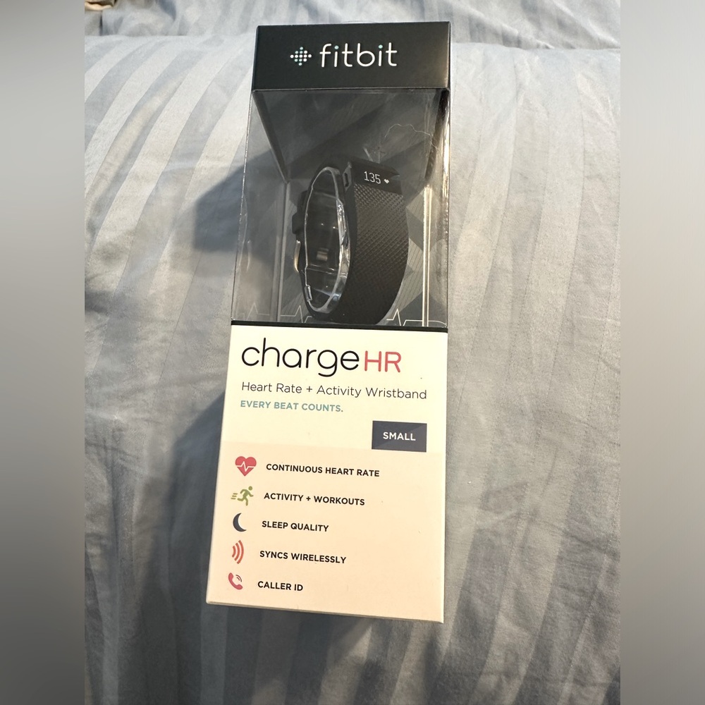 Fitbit Charge HR - new in box.  Never used.  Black.